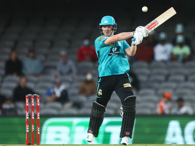 Max Bryant smashes a ball through cover against the Perth Scorchers at Marvel Stadium in January, 2022. Picture: Mike Owen/Getty Images.