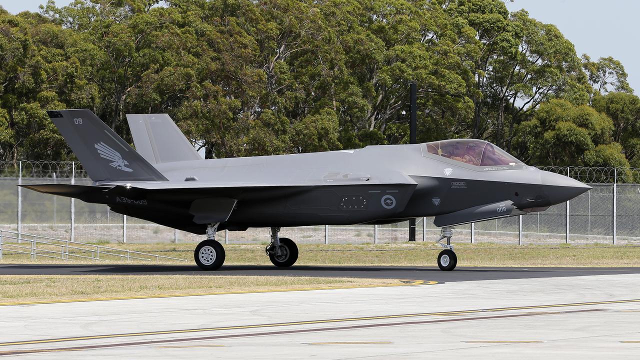 RAAF F-35 strike fighter jets arrive in Australia at Williamtown base ...