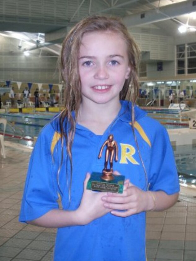 Titmus after winning one of her first national age group medals as a young child in Tasmania. Picture: Supplied