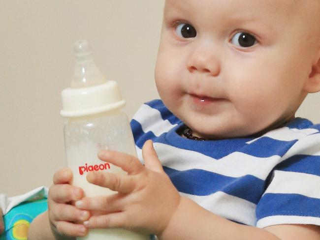 Varsity Lakes mother Kayla Zigic, 29 with 10-month-old baby Brooklyn struggles to find her brand of baby milk formula on the Gld Coast. Pic Tim Marsden