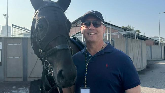 Brisbane trainer Tony Gollan with his Group 1 Hong Kong Mile Hope Antino at the Sha Tin quarantine stables.