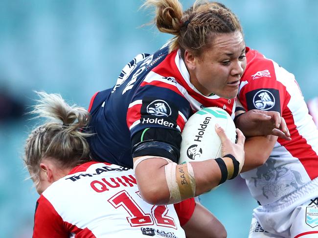 SYDNEY, AUSTRALIA - SEPTEMBER 22: Elianna Walton of the Roosters is tackled during the round three WNRL match between the Sydney Roosters and the St George Illawarra Dragons at Allianz Stadium on September 22, 2018 in Sydney, Australia.  (Photo by Cameron Spencer/Getty Images)