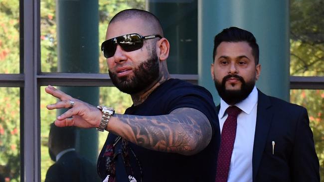 Moudi Tajjour leaves Burwood Local Court after police applied for an apprehended violence order on Sanaa Mehajer's behalf. (AAP Image/Mick Tsikas)