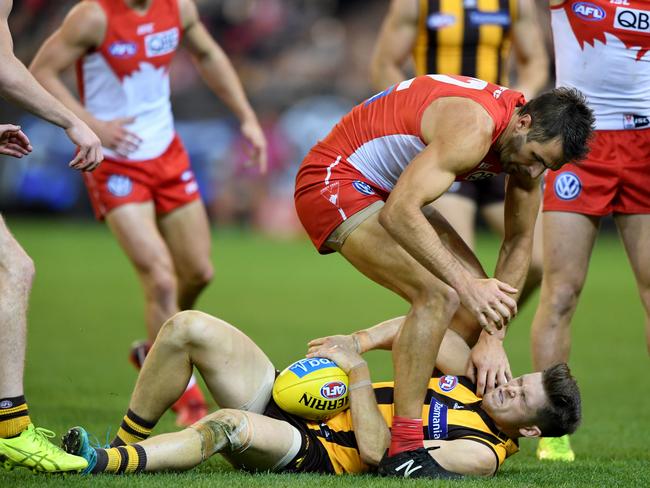 Josh Kennedy crunches Taylor Duryea.