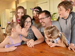 HOME FOR CHRISTMAS: Tracey Devereaux is glad to be back with her husband Bruce, and children, Grace (12), Joshua (10), Molly (8), Sophie (6) and Emily (3) after a series of 10 operation. Picture: Patrick Woods