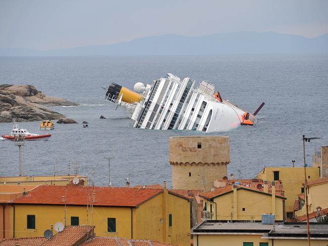 The wrecked cruise liner Costa Concordia on January 16, 2012, in the harbour of the Tuscan island of Giglio. Picture: AFP