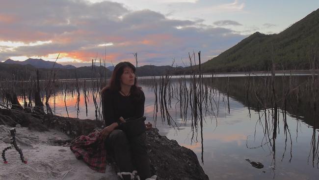 Corinne Ooms – pictured in the Tasmanian wilderness on Alone Australia – says she’d never heard of Tasmania until she holidayed in Australia but is pleased to now call the state home. Picture: Supplied