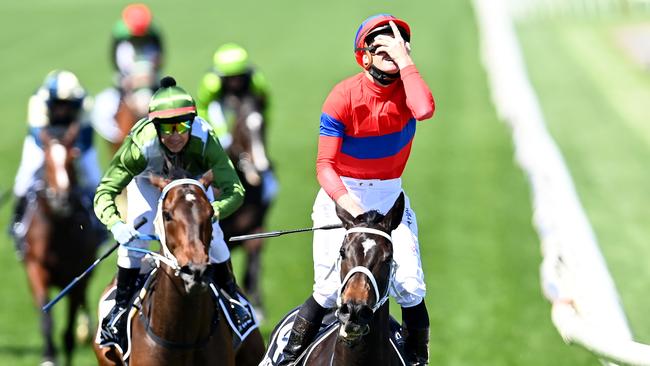 MELBOURNE, AUSTRALIA - NOVEMBER 02: James Mcdonald riding #4 Verry Elleegant wins race 7, the Lexus Melbourne Cup during 2021 Melbourne Cup Day at Flemington Racecourse on November 02, 2021 in Melbourne, Australia. (Photo by Quinn Rooney/Getty Images)