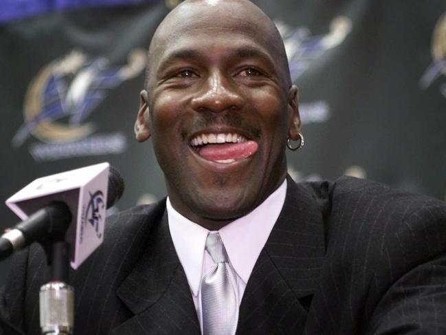 25/09/2001. FILE--Former basketball player Chicago Bulls' Michael Jordan smiles as he answers questions from the media Wednesday, Jan. 19, 2000 at the MCI Center in Washington. Jordan made his comeback official announcing he will return to play in the NBA and sign a two-year contract with the Washington Wizards. ``I am returning as a player to the game I love', said Jordan, 38 and more than three years removed from what seemed to be a storybook ending to his career. (AP Photo/Pablo Martinez Monsivais)