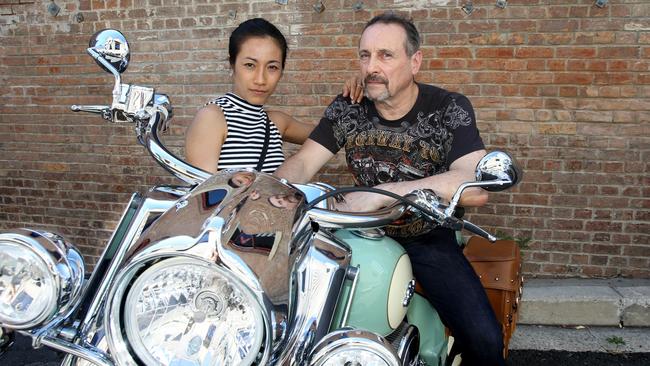 Lev Mizikovsky with girlfriend Manlika Winothai. AAP Image/Steve Pohlner