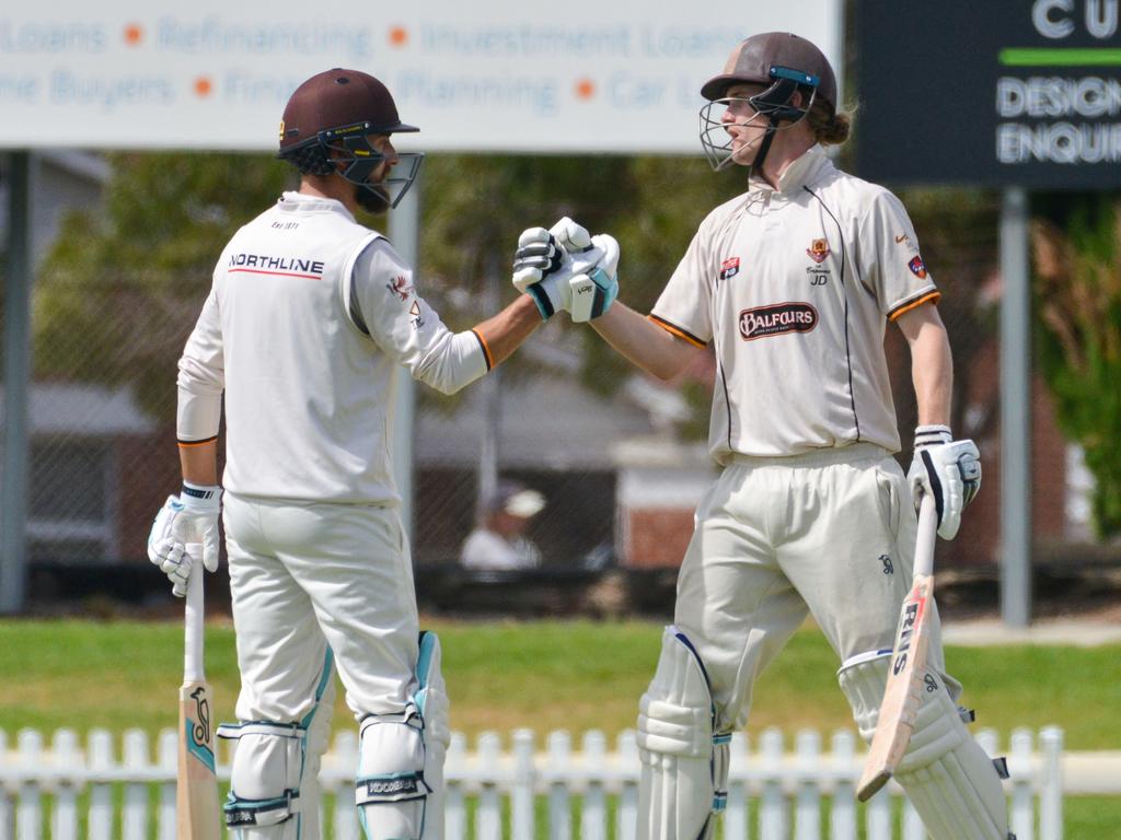 Premier cricket grand final between Kensington and Adelaide at Glenelg Oval, Saturday, March 23, 2019. Kensington batsman Josh Doyle is congratulated by Alex Ross after scoring 50 runs. (AAP Image/Brenton Edwards)