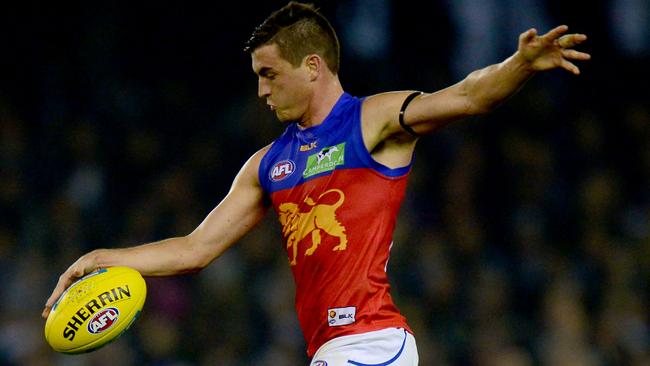 Tom Rockliff picks up another kick for the Lions.