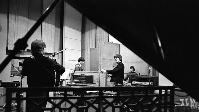 British rock band The Beatles at Abbey Road Studios while recording the band's seventh album release, 'Revolver', in 1966. Picture: Universal Music Australia