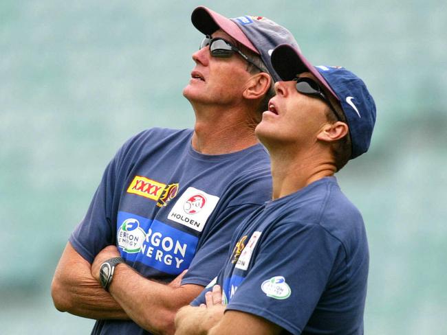 Wayne Bennett and Craig Bellamy watch a high ball during a Broncos training session. File photo