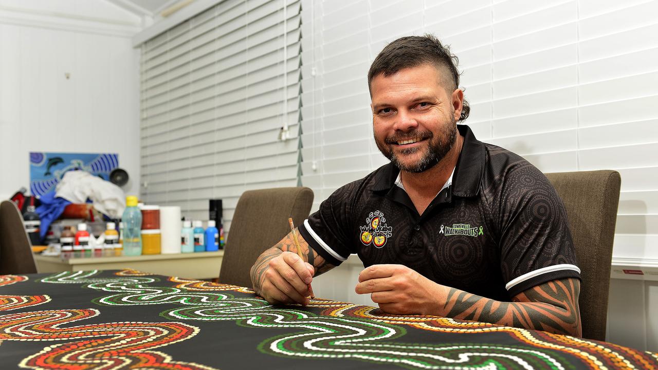 Local artist Chris Gray has donated a piece of his indigenous artwork to the Townsville University Hospital's childrens ward after picking up the hobby following a 15 year break. PICTURE: MATT TAYLOR.