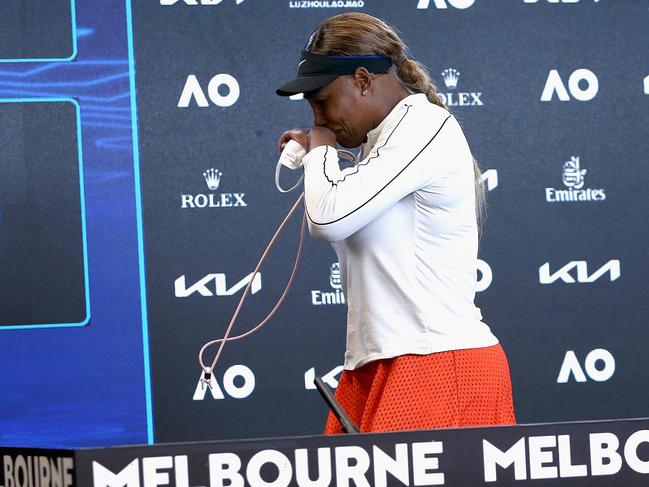 TOPSHOT - This hand out photo released by the Tennis Australia on February 18, 2021 shows Serena Williams of the US gets emotional at a press conference after losing her women's semi-final match against Japan's Naomi Osaka on day eleven of the Australian Open tennis tournament in Melbourne. (Photo by ROB PREZIOSO / TENNIS AUSTRALIA / AFP) / -----EDITORS NOTE --- RESTRICTED TO EDITORIAL USE - MANDATORY CREDIT "AFP PHOTO /ROB PREZIOSO/ TENNIS AUSTRALIA " - NO MARKETING - NO ADVERTISING CAMPAIGNS - DISTRIBUTED AS A SERVICE TO CLIENTS