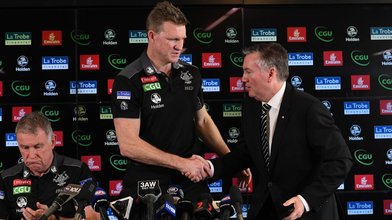 Sealed with a handshake. Can you really believe these two figures have departed the Magpies?