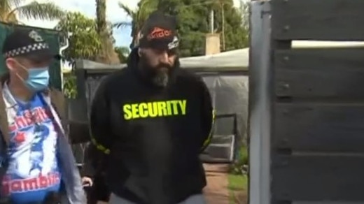 Jeremy Pope being led from his Seacombe Gardens home. Picture: 7NEWS