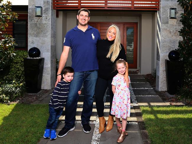 Emily and Simon Schlegel with their children Maddy (6) and Harry (4) have purchased their dream home in Manly West after reaping the rewards of their sale in Wakerley. Manly West Saturday 5th August 2023 Picture David Clark