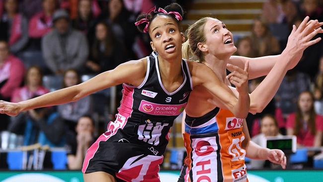 Thunderbirds defender Shamera Sterling battles with superstar Giants shooter Caitlin Bassett in Mile End. Picture: Mark Brake/Getty Images