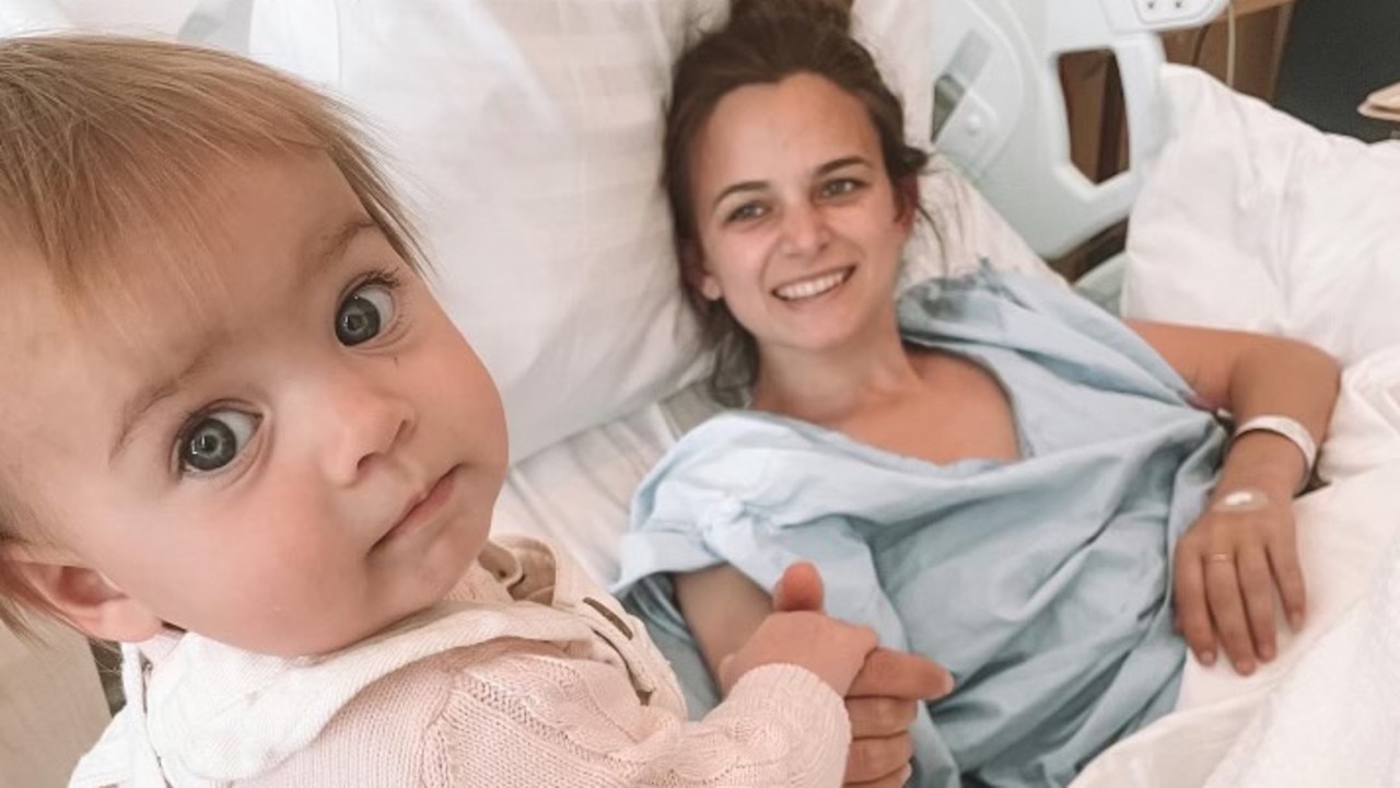 Kellie Finlayson receiving treatment in hospital, with daughter Sophia. Picture: Supplied