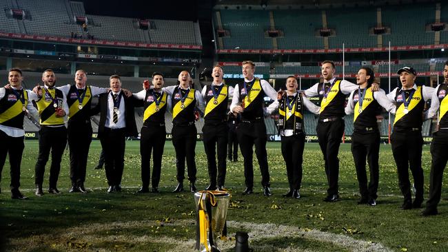 Richmond players linked arms and belted out Bruce Springsteen once the MCG was empty. Picture: Getty Images