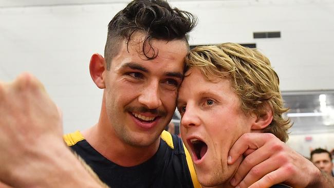 Captain Taylor Walker and vice-captain Rory Sloane celebrate after their emphatic preliminary final win. Picture: Daniel Kalisz/Getty Images