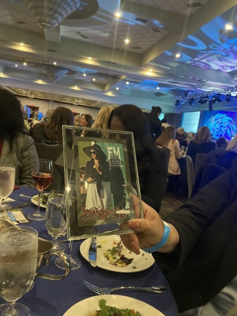 Framed photos were brought to the lavish event. Picture: Twitter / Sharon Andrea.