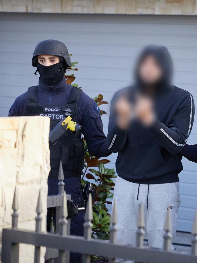 18 people were arrested and 29 search warrants executed during coordinated raids on Tuesday.