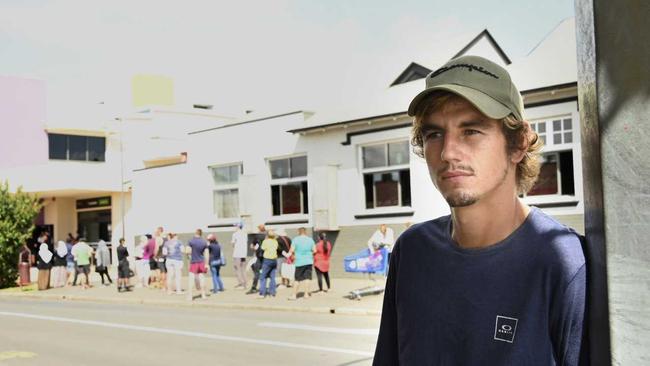 Lachlan Haywood moved to Toowoomba from Bundaberg but the job he was hired for no longer available due to coronavirus. Crowds outside Centrelink office. Picture: Bev Lacey