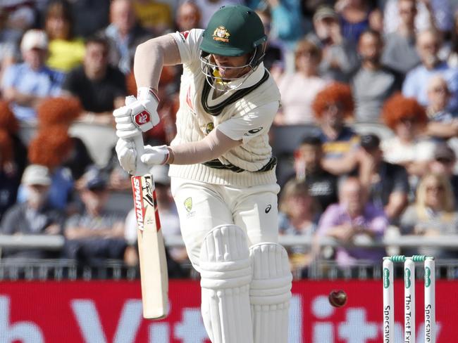 Stuart Broad traps David Warner lbw on the fourth day of the fourth Ashes Test in Manchester. Picture: AP