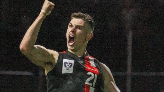 Mitch Cox celebrating a goal for the Frankston Dolphins last year.