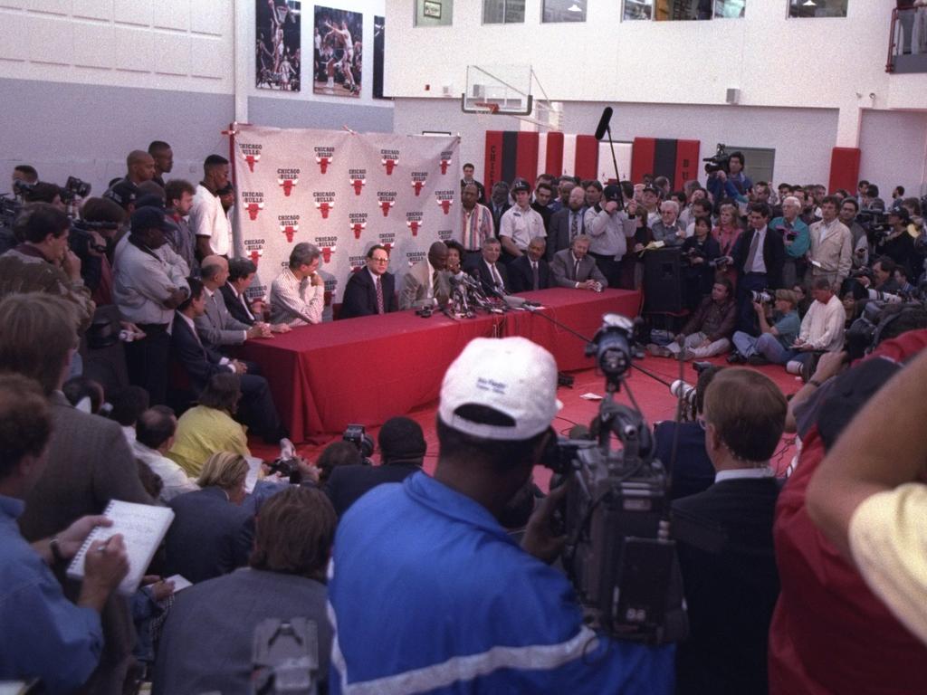 Jordan announcing his retirement in a nationally televised press conference.