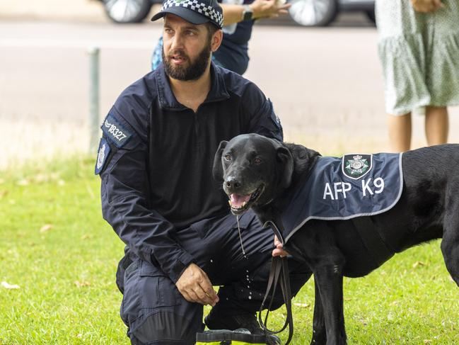 An AFP canine unit constable and his explosives Detective pooch Knox. Picture: Floss Adams.