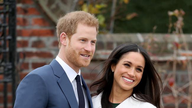 LONDON, ENGLAND - NOVEMBER 27:  Prince Harry and actress Meghan Markle during an official photocall to announce their engagement at The Sunken Gardens at Kensington Palace on November 27, 2017 in London, England.  Prince Harry and Meghan Markle have been a couple officially since November 2016 and are due to marry in Spring 2018.  (Photo by Chris Jackson/Chris Jackson/Getty Images)