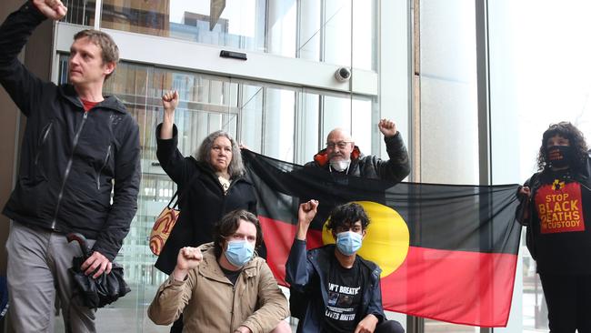 Black Lives Matter protesters outside the Supreme Court in Sydney, where they lost a legal battle to hold a demonstration in the city on Tuesday. Picture: Damian Shaw