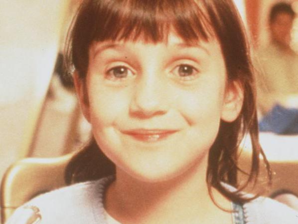 PIRATE: PIRATE: actress Mara Wilson in film scene 'Matilda' headshot alone children movies cakes desserts food sept 1996