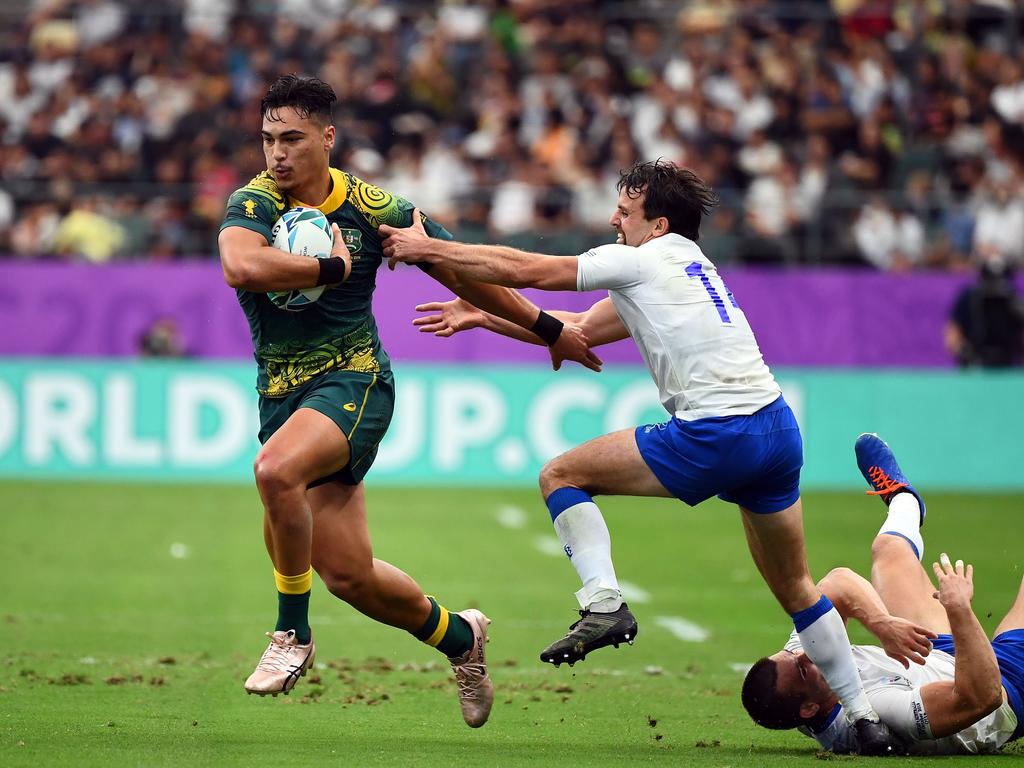 Australia's wing Jordan Petaia playing against Uruguay. (Photo by GABRIEL BOUYS / AFP)