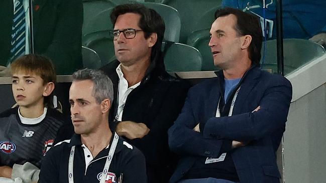 Gillon McLachlan and Andrew Dillon at the footy together on Friday night. Picture: Getty Images