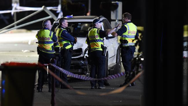 Police at the scene on Sunday night. Picture: Josie Hayden