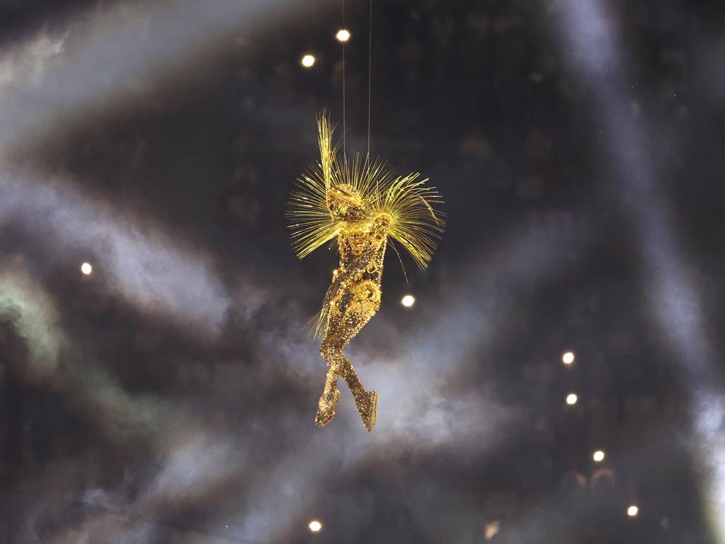 The Golden Voyager descends into the stadium during the closing ceremony. Picture: Getty Images