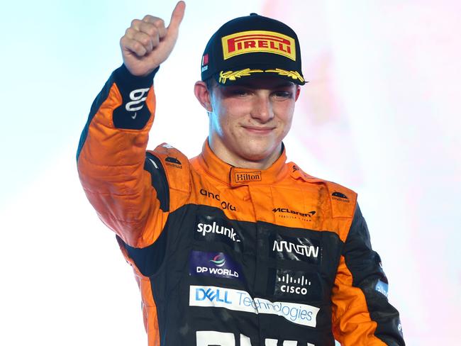 LUSAIL CITY, QATAR - OCTOBER 08: Second placed Oscar Piastri of Australia and McLaren celebrates on the podium during the F1 Grand Prix of Qatar at Lusail International Circuit on October 08, 2023 in Lusail City, Qatar. (Photo by Clive Rose/Getty Images)