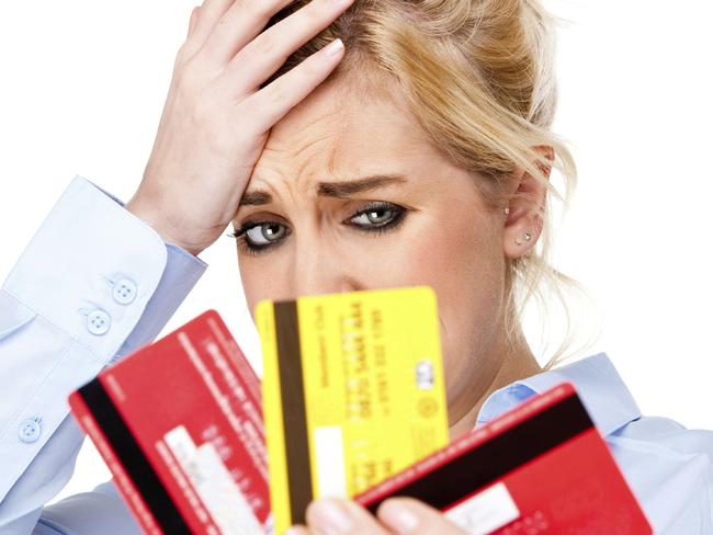 Credit Card Debt Attractive Young Woman With Money Worries Picture: Thinkstock