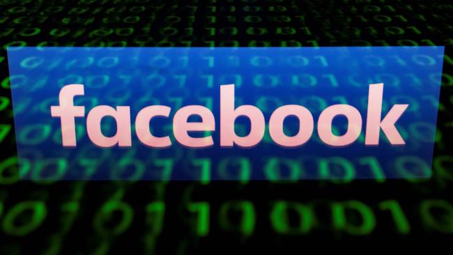 The logo of social network Facebook displayed on a screen and reflected on a tablet in Paris. Picture: AFP