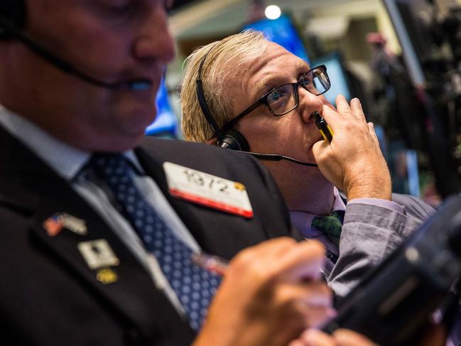 NEW YORK, NY - SEPTEMBER 02: Traders work on the floor of the New York Stock Exchange during the afternoon of September 2, 2015 in New York City. After three days of losses the market closed nearly 300 points up this afternoon. Andrew Burton/Getty Images/AFP == FOR NEWSPAPERS, INTERNET, TELCOS & TELEVISION USE ONLY ==