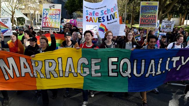 Pro-gay marriage supporters during a rally in Sydney. Picture: AFP Photo/Saeed Khan