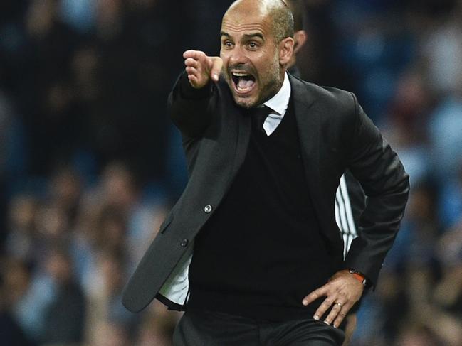 Manchester City's Spanish manager Pep Guardiola gesutres on the touchline during the UEFA Champions League group C football match between Manchester City and Borussia Monchengladbach at the Etihad stadium in Manchester, northwest England, on September 14, 2016. / AFP PHOTO / OLI SCARFF