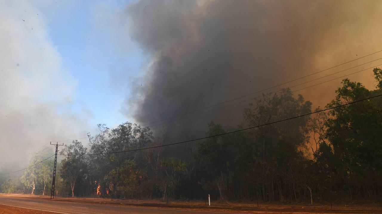 Firefighters contain bushfires in Humpty Doo near Hayball Road, Collard Road, Freds Pass Road, Barrow Road, and Kennedy Road in late August. Picture: Katrina Bridgeford