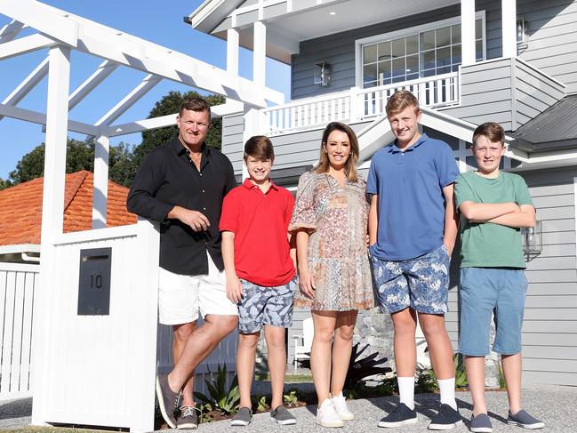 Jason and Kerry Fenton with Harvey, 11, William, 14, and Jackson, 12, at the home they are selling in Wavell Heights. Pics Tara Croser.