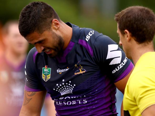 Storm's Jesse Bromwich goes off injured during the Round 1 2017 NRL game between the Bulldogs and the Melbourne Storm at Southern Cross Group Stadium , Cronulla . Picture : Gregg Porteous